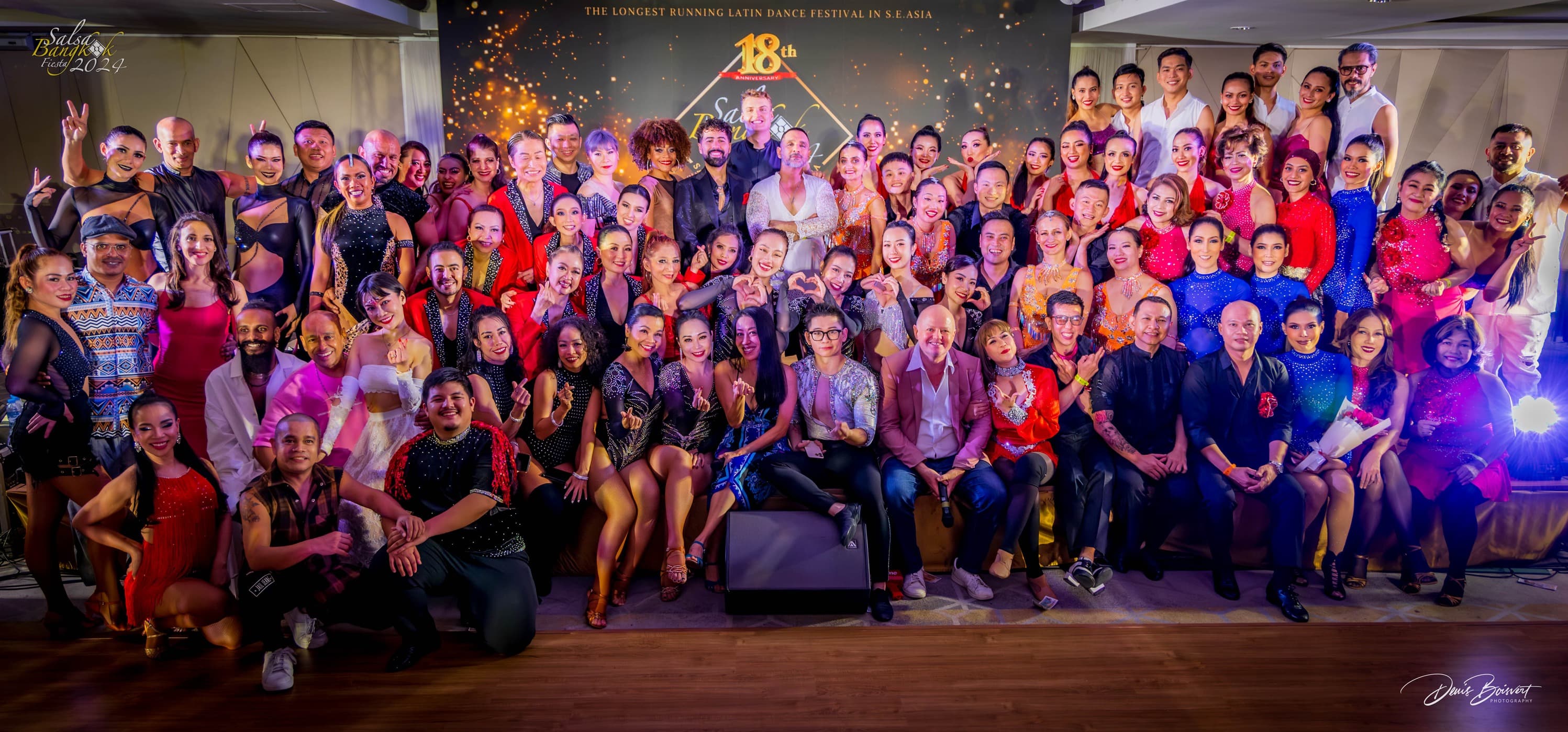 Social dancers on the floor during a Latin dance event